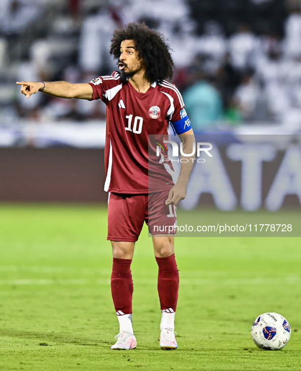 Akram Afif (C) (#10) of Qatar plays during the FIFA World Cup 2026 AFC Asian Qualifiers third round group A match between Qatar and Uzbekist...