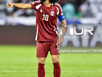 Akram Afif (C) (#10) of Qatar plays during the FIFA World Cup 2026 AFC Asian Qualifiers third round group A match between Qatar and Uzbekist...