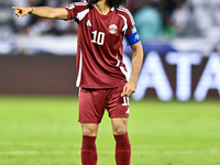 Akram Afif (C) (#10) of Qatar plays during the FIFA World Cup 2026 AFC Asian Qualifiers third round group A match between Qatar and Uzbekist...