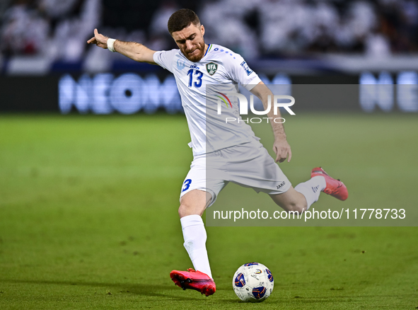 Sherzod Asullaev (#13) of Uzbekistan plays in the FIFA World Cup 2026 AFC Asian Qualifiers third round group A match between Qatar and Uzbek...