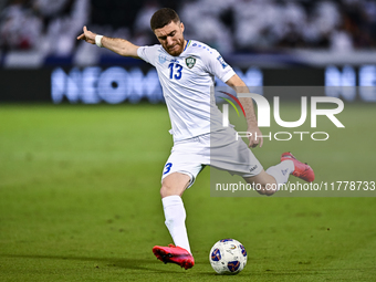 Sherzod Asullaev (#13) of Uzbekistan plays in the FIFA World Cup 2026 AFC Asian Qualifiers third round group A match between Qatar and Uzbek...