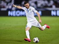 Sherzod Asullaev (#13) of Uzbekistan plays in the FIFA World Cup 2026 AFC Asian Qualifiers third round group A match between Qatar and Uzbek...