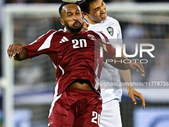 Ahmed Fathy (#20) of Qatar battles for the ball with Otabek Shukurov (#7) of Uzbekistan during the FIFA World Cup 2026 AFC Asian Qualifiers...