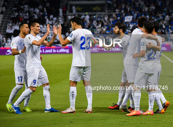 Abbosbek Fayazullaev (R) of Uzbekistan celebrates with his teammate after scoring a goal during the FIFA World Cup 2026 AFC Asian Qualifiers...