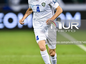 Farrukh Sayfiev (#4) of Uzbekistan plays in the FIFA World Cup 2026 AFC Asian Qualifiers third round group A match between Qatar and Uzbekis...