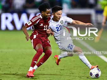 Yusuf Abdurisag (#11) of Qatar battles for the ball with Abbosbek Fayazullaev (#22) of Uzbekistan during the FIFA World Cup 2026 AFC Asian Q...