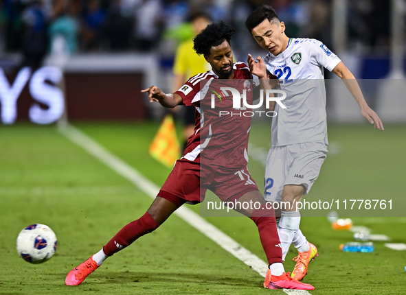 Yusuf Abdurisag (#11) of Qatar battles for the ball with Abbosbek Fayazullaev (#22) of Uzbekistan during the FIFA World Cup 2026 AFC Asian Q...