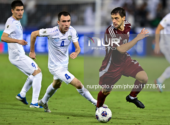 Lucas Mendes (#12) of Qatar battles for the ball with Farrukh Sayfiev (#4) of Uzbekistan during the FIFA World Cup 2026 AFC Asian Qualifiers...