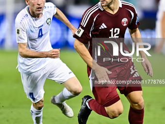 Lucas Mendes (#12) of Qatar battles for the ball with Farrukh Sayfiev (#4) of Uzbekistan during the FIFA World Cup 2026 AFC Asian Qualifiers...