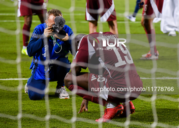 Almoez Ali (#19) of Qatar reacts after winning the FIFA World Cup 2026 AFC Asian Qualifiers third round group A match between Qatar and Uzbe...