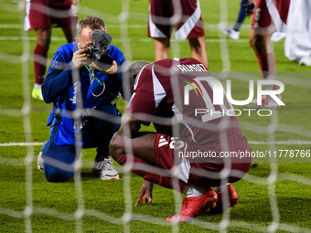 Almoez Ali (#19) of Qatar reacts after winning the FIFA World Cup 2026 AFC Asian Qualifiers third round group A match between Qatar and Uzbe...