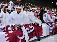 Fans of Qatar celebrate after winning the FIFA World Cup 2026 AFC Asian Qualifiers third round group A match between Qatar and Uzbekistan at...