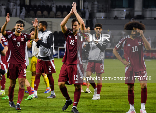 Players of Qatar applaud the fans after winning the FIFA World Cup 2026 AFC Asian Qualifiers third round group A match between Qatar and Uzb...