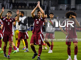 Players of Qatar applaud the fans after winning the FIFA World Cup 2026 AFC Asian Qualifiers third round group A match between Qatar and Uzb...