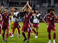 Players of Qatar applaud the fans after winning the FIFA World Cup 2026 AFC Asian Qualifiers third round group A match between Qatar and Uzb...