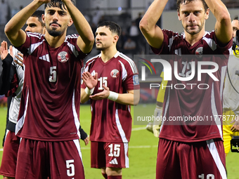 Players of Qatar applaud the fans after winning the FIFA World Cup 2026 AFC Asian Qualifiers third round group A match between Qatar and Uzb...