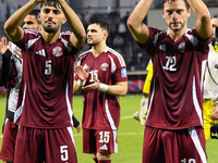 Players of Qatar applaud the fans after winning the FIFA World Cup 2026 AFC Asian Qualifiers third round group A match between Qatar and Uzb...