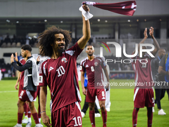 Players of Qatar applaud the fans after winning the FIFA World Cup 2026 AFC Asian Qualifiers third round group A match between Qatar and Uzb...