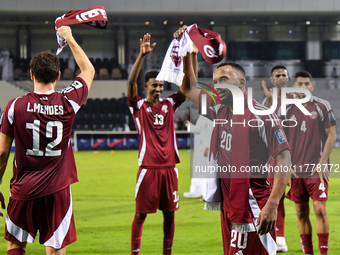 Players of Qatar applaud the fans after winning the FIFA World Cup 2026 AFC Asian Qualifiers third round group A match between Qatar and Uzb...