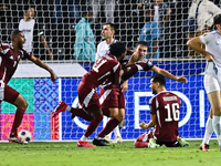 Lucas Mendes of Qatar celebrates with his teammates after scoring a goal during the FIFA World Cup 2026 AFC Asian Qualifiers third round gro...