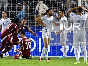 Lucas Mendes (3-L) of Qatar celebrates with his teammates after scoring a goal during the FIFA World Cup 2026 AFC Asian Qualifiers third rou...