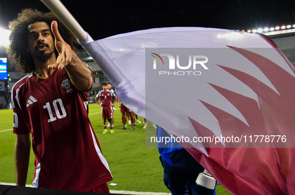 Akram Afif of Qatar celebrates after winning the FIFA World Cup 2026 AFC Asian Qualifiers third round group A match between Qatar and Uzbeki...