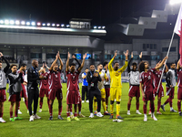 Players of Qatar applaud the fans after winning the FIFA World Cup 2026 AFC Asian Qualifiers third round group A match between Qatar and Uzb...