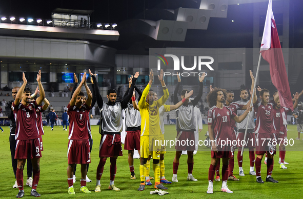 Players of Qatar applaud the fans after winning the FIFA World Cup 2026 AFC Asian Qualifiers third round group A match between Qatar and Uzb...