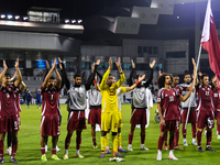 Players of Qatar applaud the fans after winning the FIFA World Cup 2026 AFC Asian Qualifiers third round group A match between Qatar and Uzb...