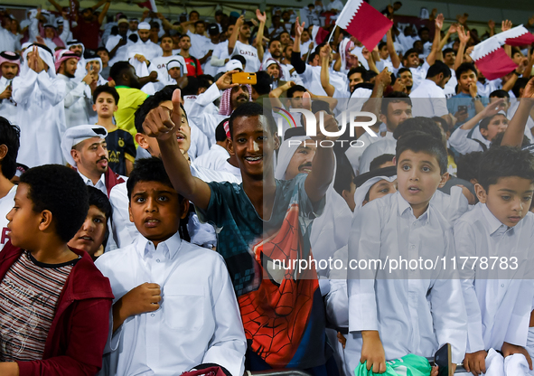 Fans of Qatar celebrate after winning the FIFA World Cup 2026 AFC Asian Qualifiers third round group A match between Qatar and Uzbekistan at...