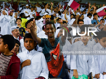 Fans of Qatar celebrate after winning the FIFA World Cup 2026 AFC Asian Qualifiers third round group A match between Qatar and Uzbekistan at...