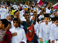 Fans of Qatar celebrate after winning the FIFA World Cup 2026 AFC Asian Qualifiers third round group A match between Qatar and Uzbekistan at...