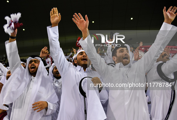 Fans of Qatar celebrate after winning the FIFA World Cup 2026 AFC Asian Qualifiers third round group A match between Qatar and Uzbekistan at...