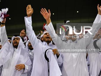 Fans of Qatar celebrate after winning the FIFA World Cup 2026 AFC Asian Qualifiers third round group A match between Qatar and Uzbekistan at...