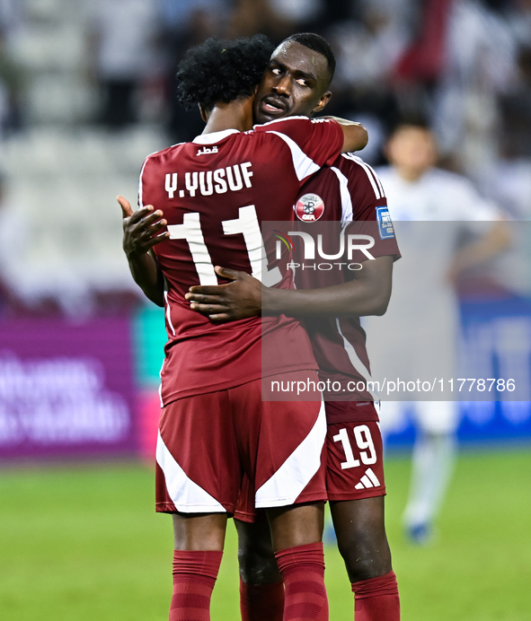 Almoez Ali (R) and Yusuf Abdurisag (L) of Qatar celebrate after they win the FIFA World Cup 2026 AFC Asian Qualifiers third round group A ma...