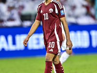 Akram Afif of Qatar celebrates after winning the FIFA World Cup 2026 AFC Asian Qualifiers third round group A match between Qatar and Uzbeki...