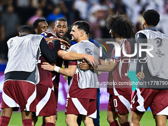 Players of Qatar celebrate after they win the FIFA World Cup 2026 AFC Asian Qualifiers third round group A match between Qatar and Uzbekista...