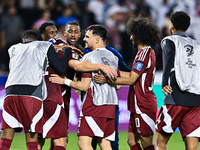 Players of Qatar celebrate after they win the FIFA World Cup 2026 AFC Asian Qualifiers third round group A match between Qatar and Uzbekista...