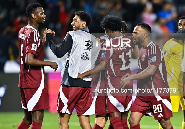 Players of Qatar celebrate after they win the FIFA World Cup 2026 AFC Asian Qualifiers third round group A match between Qatar and Uzbekista...