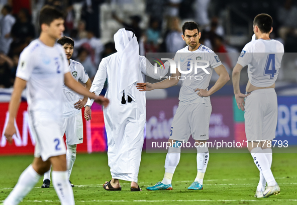 Uzbekistan players show their dejection after the FIFA World Cup 2026 AFC Asian Qualifiers third round group A match between Qatar and Uzbek...