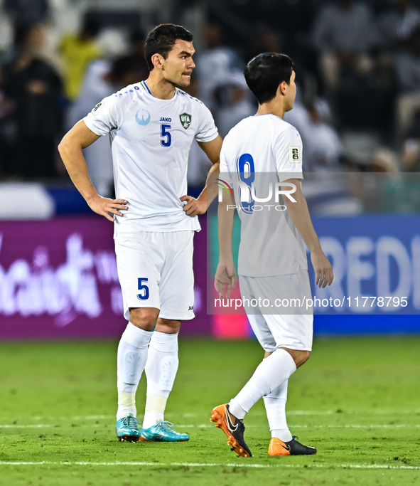 Uzbekistan players show their dejection after the FIFA World Cup 2026 AFC Asian Qualifiers third round group A match between Qatar and Uzbek...