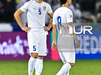 Uzbekistan players show their dejection after the FIFA World Cup 2026 AFC Asian Qualifiers third round group A match between Qatar and Uzbek...