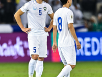 Uzbekistan players show their dejection after the FIFA World Cup 2026 AFC Asian Qualifiers third round group A match between Qatar and Uzbek...