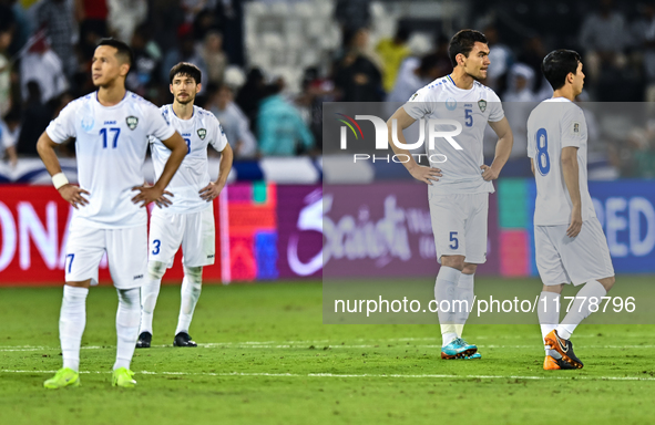 Uzbekistan players show their dejection after the FIFA World Cup 2026 AFC Asian Qualifiers third round group A match between Qatar and Uzbek...