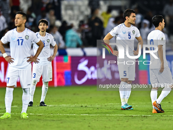 Uzbekistan players show their dejection after the FIFA World Cup 2026 AFC Asian Qualifiers third round group A match between Qatar and Uzbek...