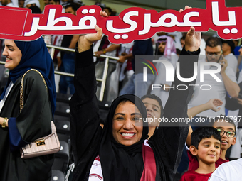 Fans of Qatar celebrate after winning the FIFA World Cup 2026 AFC Asian Qualifiers third round group A match between Qatar and Uzbekistan at...