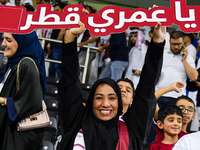 Fans of Qatar celebrate after winning the FIFA World Cup 2026 AFC Asian Qualifiers third round group A match between Qatar and Uzbekistan at...