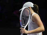 RIYADH, SAUDI ARABIA - NOVEMBER 05: Iga Swiatek of Poland during her match against Coco Gauff of USA, on day 4 of the 2024 WTA Finals, part...