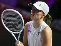 RIYADH, SAUDI ARABIA - NOVEMBER 05: Iga Swiatek of Poland during her match against Coco Gauff of USA, on day 4 of the 2024 WTA Finals, part...