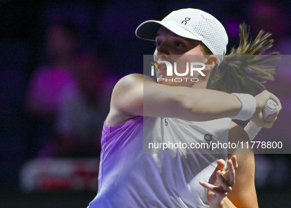 RIYADH, SAUDI ARABIA - NOVEMBER 05: Iga Swiatek of Poland during her match against Coco Gauff of USA, on day 4 of the 2024 WTA Finals, part...